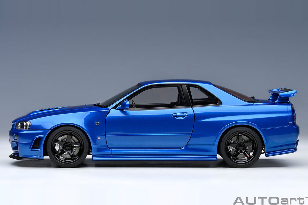 Side profile of Bayside Blue Nissan Skyline GT-R R34 Nismo diecast model