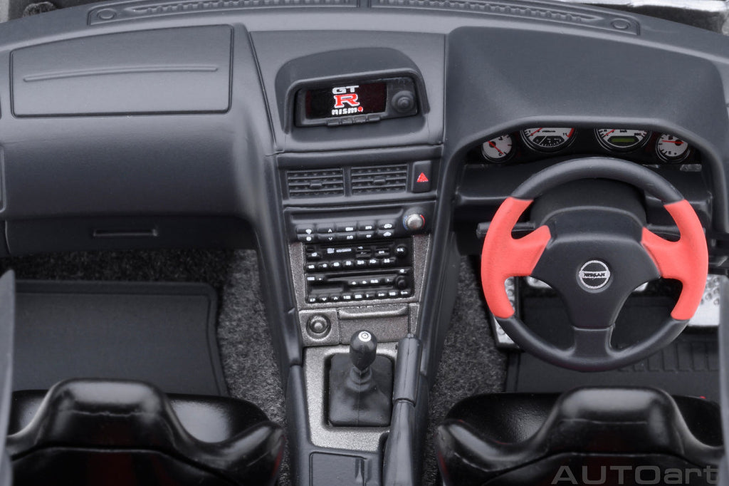 Interior dashboard view of 1/18 Nissan Skyline R34