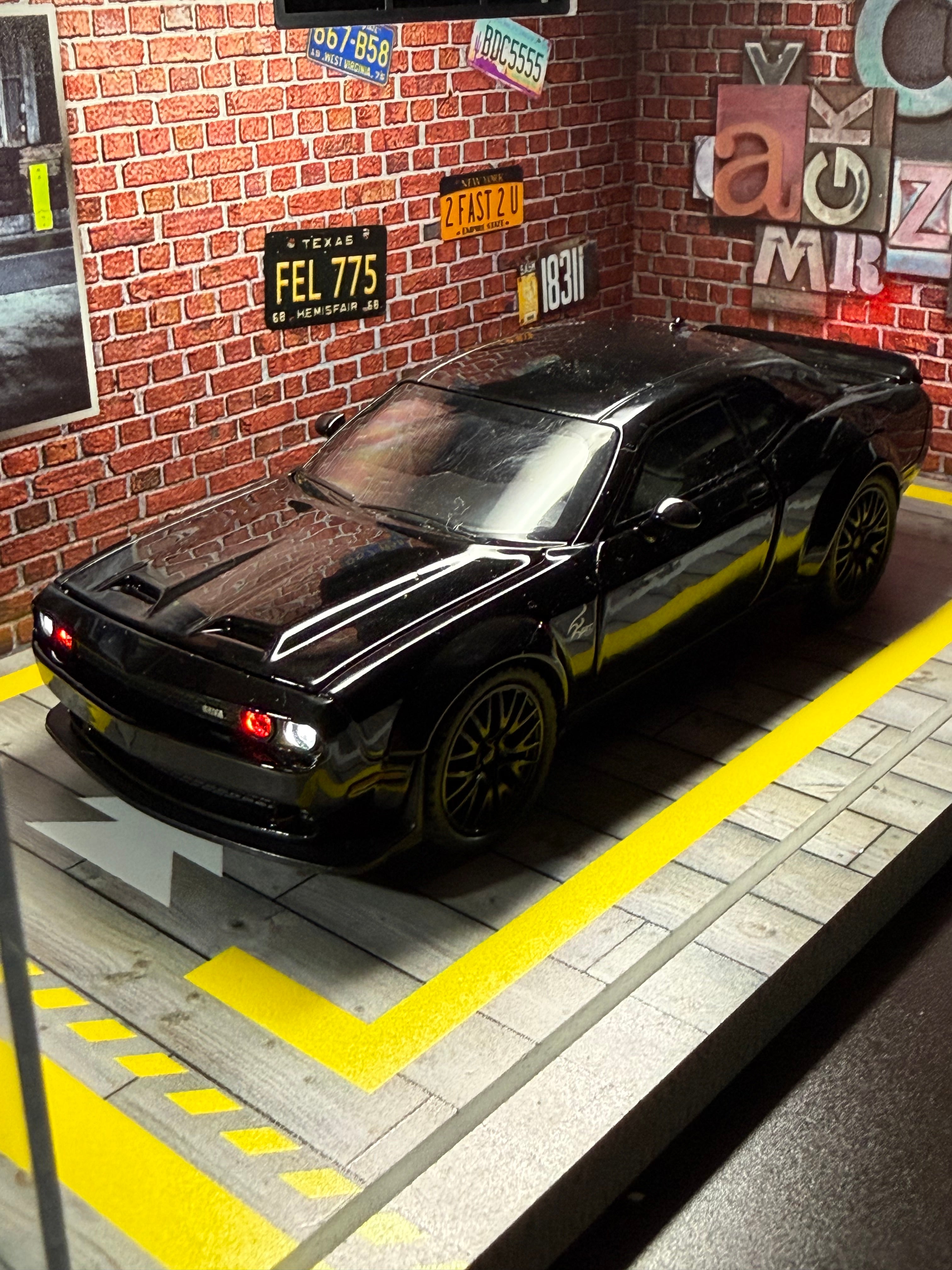 1:32 scale Dodge Challenger SRT Hellcat diecast model in gloss black front view