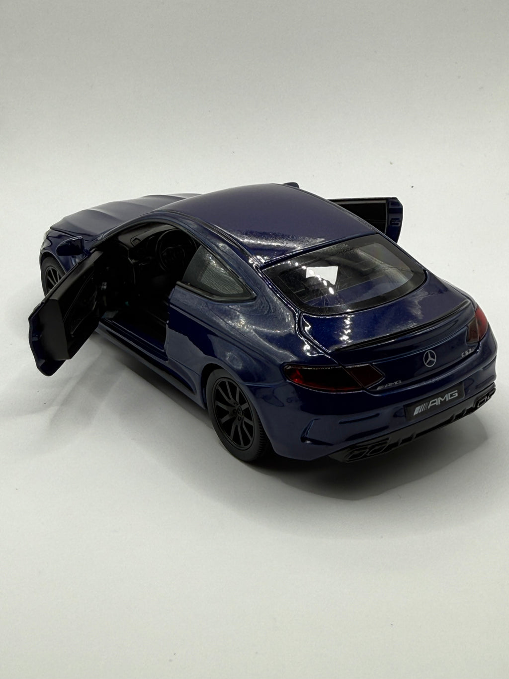 Rear view of Mercedes-Benz C63S AMG 1/32 scale replica with quad exhausts