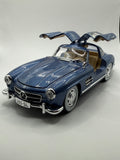 1:24 scale Mercedes-Benz 300 SL diecast model car in [Blue], 1954 Gullwing alloy replica.