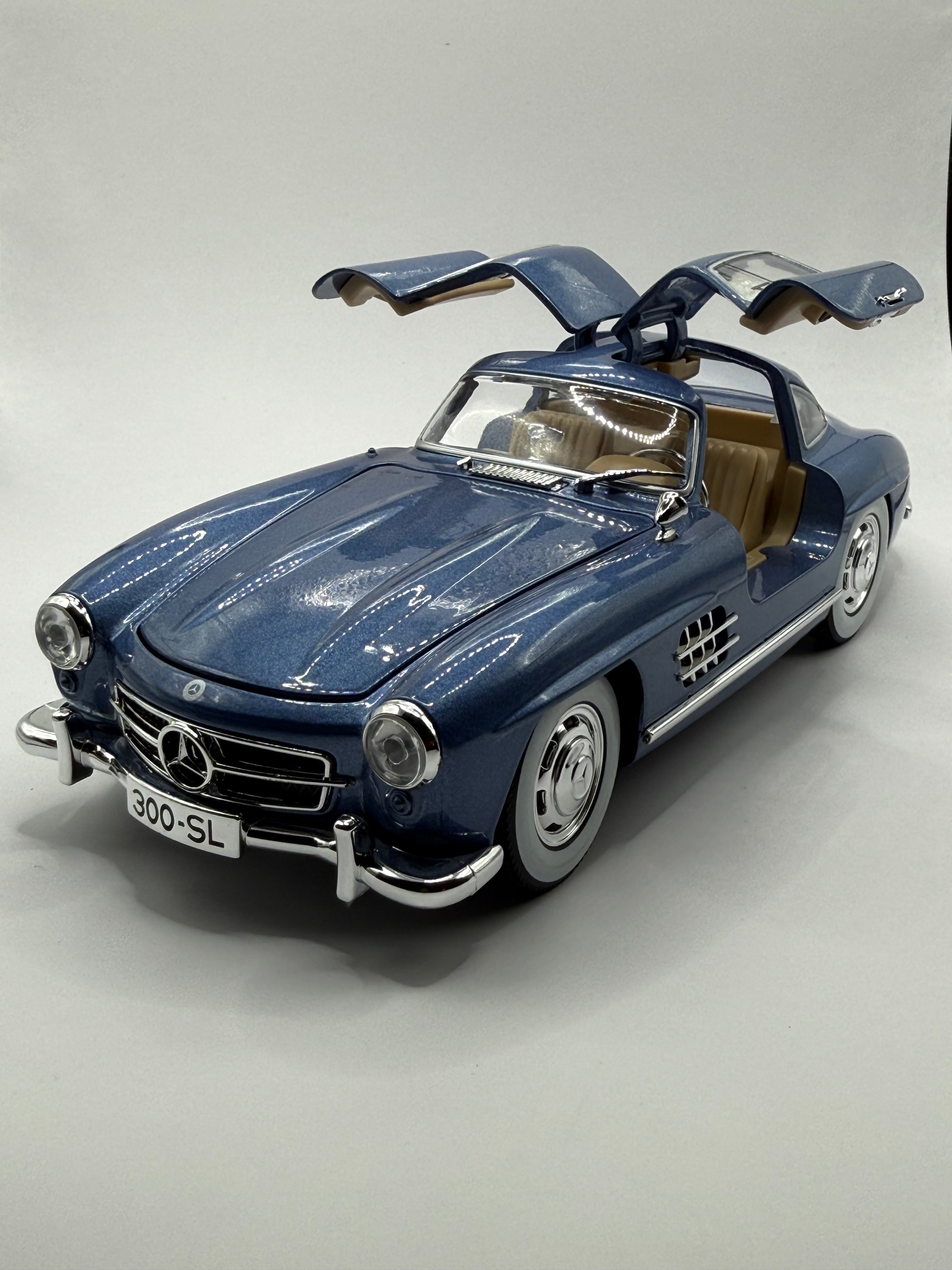 1:24 scale Mercedes-Benz 300 SL diecast model car in [Blue], 1954 Gullwing alloy replica.