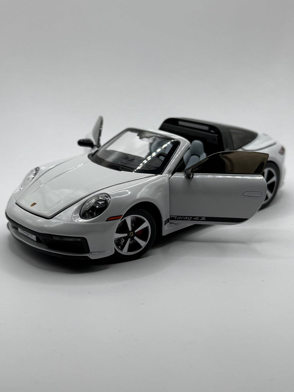 1:32 scale Porsche 911 Targa 4S diecast model car front view with doors open.
