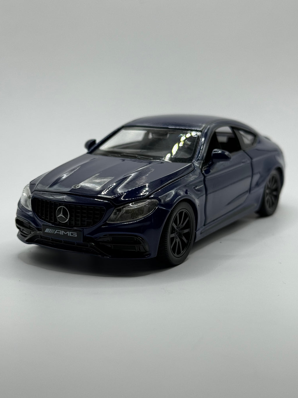 Front view of 1/32 Mercedes AMG C63S diecast model car in Blue