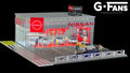 Front view of G-Fans 1:64 Nissan Nismo dealership diorama with LED lights on.