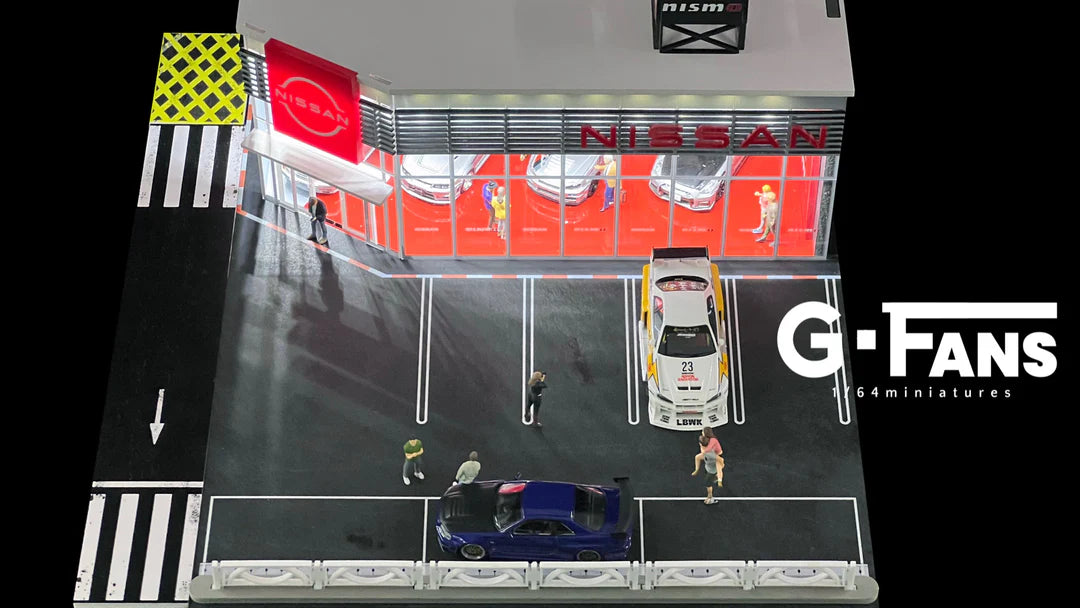 Top down view of 1/64 scale model car parking lot and showroom.
