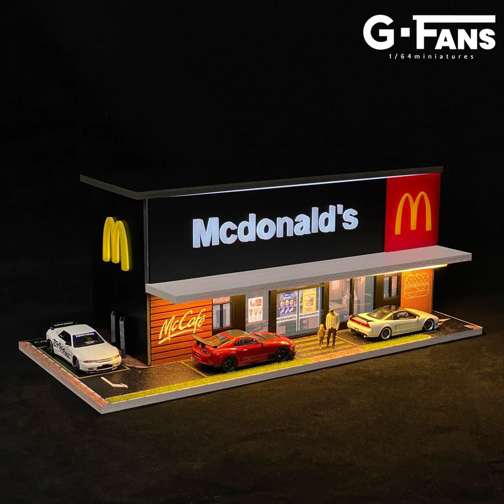 Front view of G-Fans 1:64 McDonald's diorama with LED lights on.