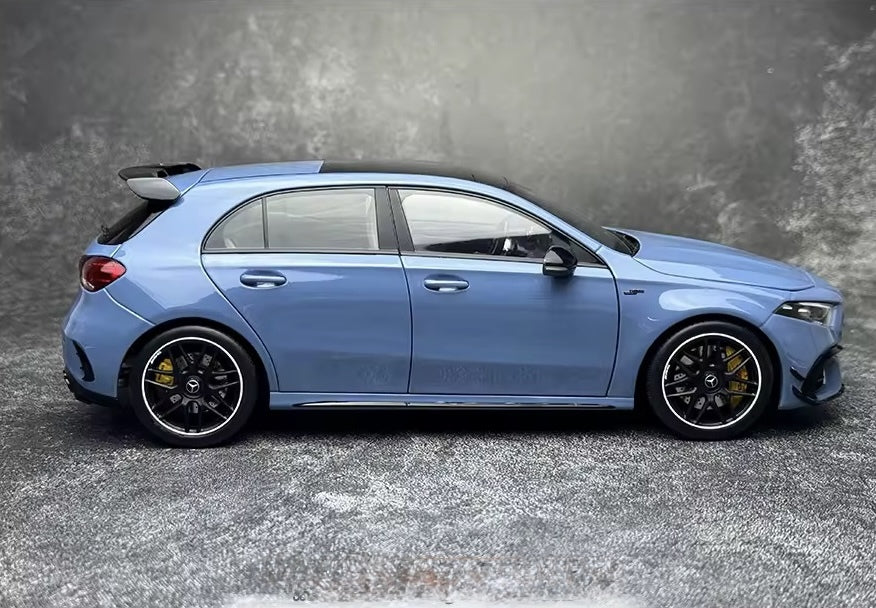 Side profile of the 1:18 Mercedes AMG A45S diecast replica by Kiloworks, highlighting the aggressive stance, black alloy wheels, and detailed brake calipers.