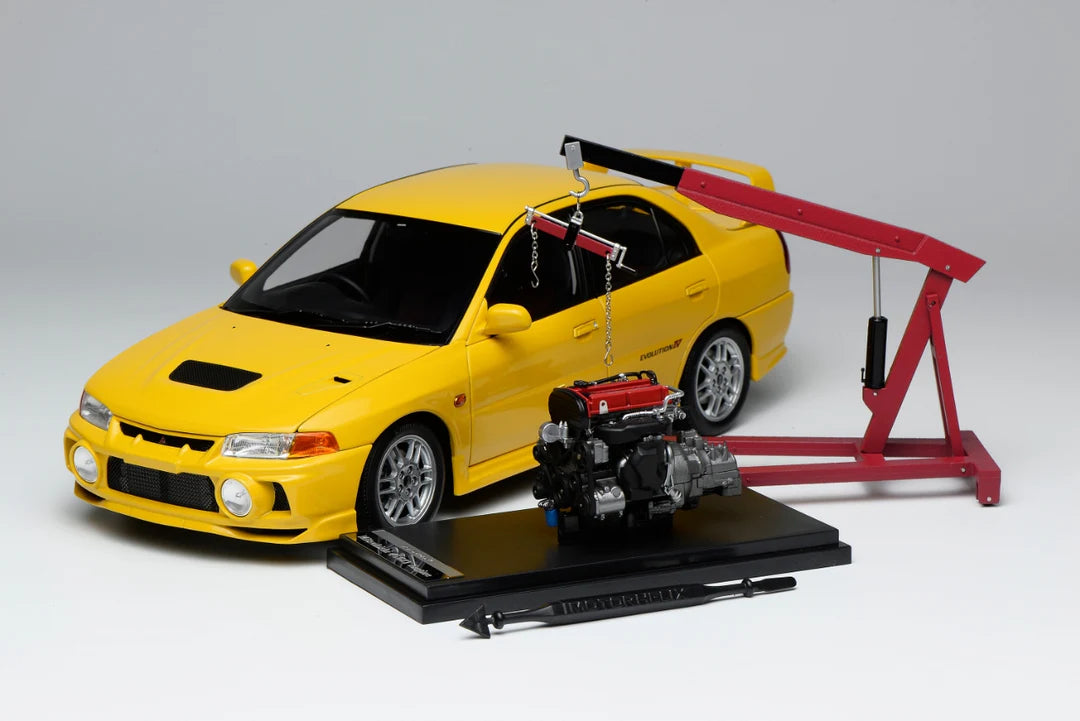 Motorhelix 1:18 Mitsubishi Lancer Evolution 4 IV Dandelion Yellow front view