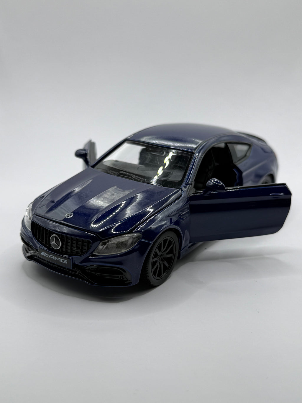 Front view of 1/32 Mercedes AMG C63S diecast model car in Blue
