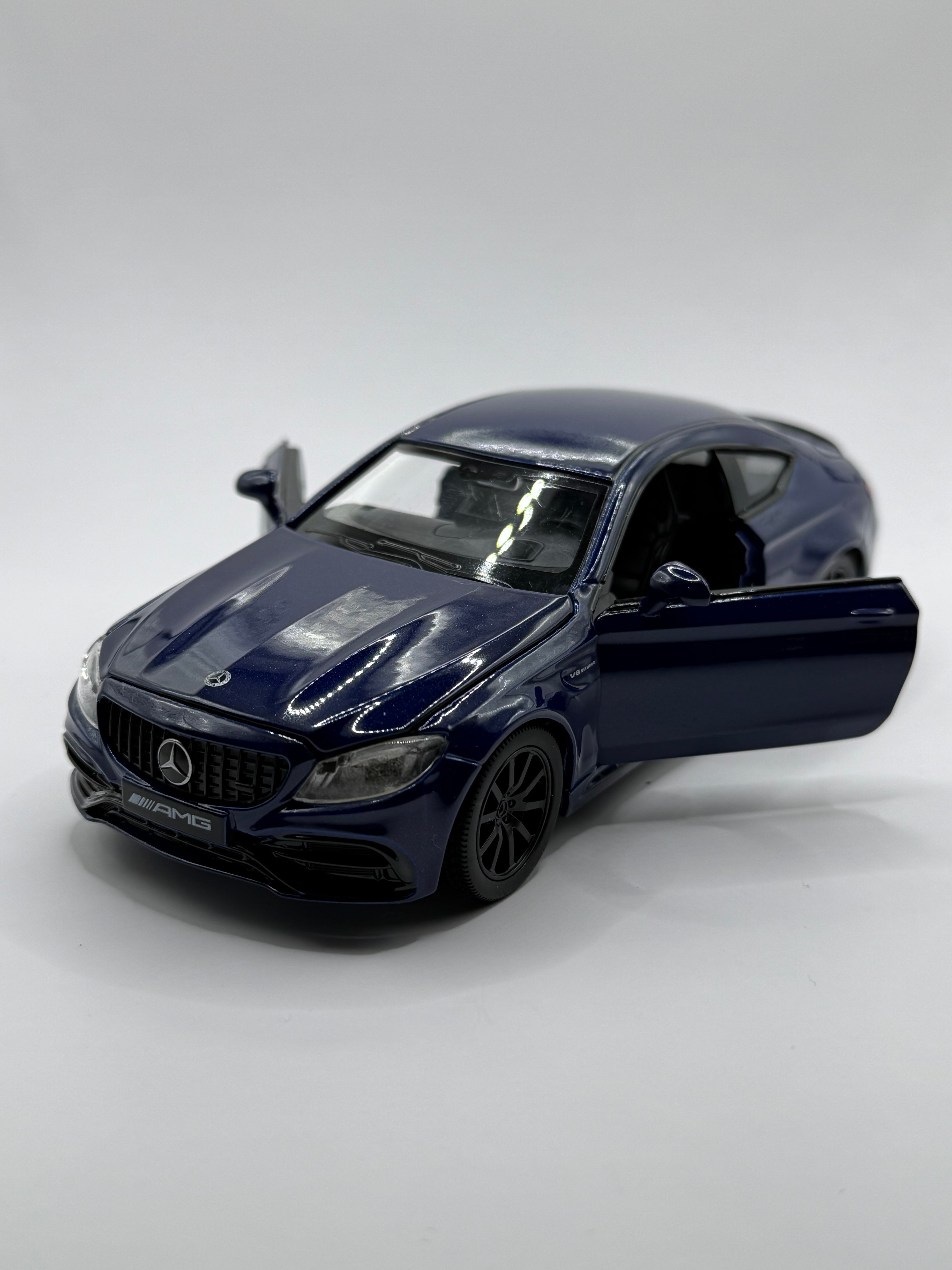 Front view of 1/32 Mercedes AMG C63S diecast model car in Blue