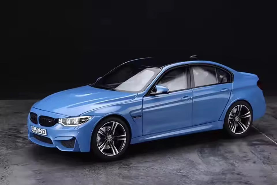 Norev 1:18 scale diecast BMW M3 F80 2015 in Yas Marina Blue metallic front angle